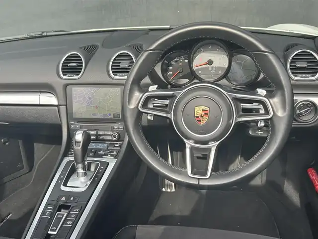 ポルシェ ７１８ボクスター S 茨城県 2017(平29)年 1.5万km ピュアホワイト スポーツエキゾースト/純正ナビ/（AM.FM.CD.BT）/バックカメラ/ETC2.0/ハーフレザーシート/D/N席シートH/HIDヘッドライト/オートライト/Pシフト/純正19インチAW/レッドキャリパー/スペアキー有/保証書/取扱説明書/記録簿5枚有り