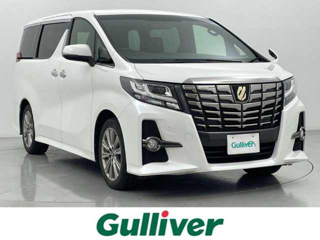 トヨタ アルファード S Aパッケージ タイプブラック 熊本県 2016(平28)年 8.3万km ホワイトパールクリスタルシャイン 社外１１インチナビ（ＣＤ・ＤＶＤ・フルセグ・ＢＴ）/社外フリップダウンモニター　/バックカメラ　/ビルトインＥＴＣ　/両側パワースライドドア　/クルーズコントロール　/前後クリアランスソナー　/パワーバックドア/ハーフレザーシート/電動パーキング/ブレーキホールド/オットマン/純正フロアマット/純正１８インチAW/オートライト/LEDヘッドライト/フォグランプ/スマートキー/プッシュスタート/保証書/取扱説明書