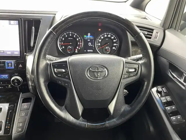 トヨタ アルファード S Aパッケージ タイプブラック 熊本県 2016(平28)年 8.3万km ホワイトパールクリスタルシャイン 社外１１インチナビ（ＣＤ・ＤＶＤ・フルセグ・ＢＴ）/社外フリップダウンモニター　/バックカメラ　/ビルトインＥＴＣ　/両側パワースライドドア　/クルーズコントロール　/前後クリアランスソナー　/パワーバックドア/ハーフレザーシート/電動パーキング/ブレーキホールド/オットマン/純正フロアマット/純正１８インチAW/オートライト/LEDヘッドライト/フォグランプ/スマートキー/プッシュスタート/保証書/取扱説明書