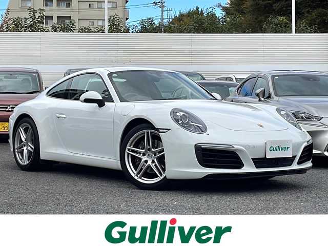 ポルシェ ９１１ カレラ 東京都 2017(平29)年 1.8万km ピュアホワイト 新車時保証書　整備記録簿/取扱説明書/ポルシェアクティブセーフ/アダプティブクルーズコントロール/アイドリングストップ/純正ナビ/BT/USB/SD/バックカメラ　ETC【DSRC】/ドライブレコーダー【前後】/レザーシート/シートヒーター/フロント背もたれパワーシート/アクティブサスペンション【PASM】/キーレスキー×２/LEDヘッドライト/オートライト/パドルシフト付皮巻きハンドル/純正19インチアルミ
