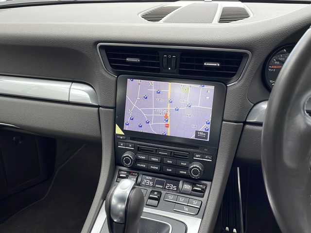 ポルシェ ９１１ カレラ 東京都 2017(平29)年 1.8万km ピュアホワイト 新車時保証書　整備記録簿/取扱説明書/ポルシェアクティブセーフ/アダプティブクルーズコントロール/アイドリングストップ/純正ナビ/BT/USB/SD/バックカメラ　ETC【DSRC】/ドライブレコーダー【前後】/レザーシート/シートヒーター/フロント背もたれパワーシート/アクティブサスペンション【PASM】/キーレスキー×２/LEDヘッドライト/オートライト/パドルシフト付皮巻きハンドル/純正19インチアルミ