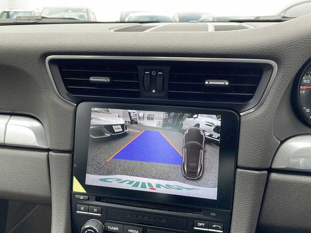 ポルシェ ９１１ カレラ 東京都 2017(平29)年 1.8万km ピュアホワイト 新車時保証書　整備記録簿/取扱説明書/ポルシェアクティブセーフ/アダプティブクルーズコントロール/アイドリングストップ/純正ナビ/BT/USB/SD/バックカメラ　ETC【DSRC】/ドライブレコーダー【前後】/レザーシート/シートヒーター/フロント背もたれパワーシート/アクティブサスペンション【PASM】/キーレスキー×２/LEDヘッドライト/オートライト/パドルシフト付皮巻きハンドル/純正19インチアルミ