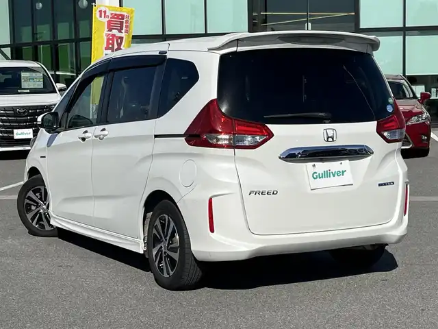 ホンダ フリード ハイブリット EX 奈良県 2017(平29)年 6.8万km ホワイトオーキッドパール 純正ナビ（VXM-174VFXi）/（フルセグ/BT/CD/DVD)/レーダークルーズコントロール/バックカメラ/衝突軽減システム/レーンキープアシスト/両側パワースライドドア/ハーフレザーシート/前席シートヒーター/後席サンシェード/オートライト/前後ドライブレコーダー/ETC/純正15インチＡＷ/取り扱い説明書/スペアキーＸ１