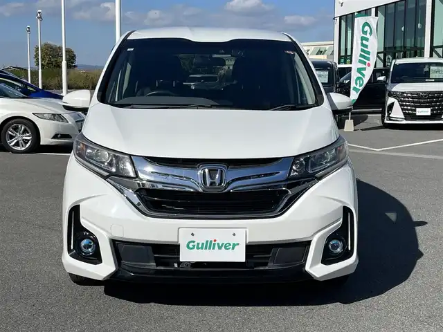 ホンダ フリード ハイブリット EX 奈良県 2017(平29)年 6.8万km ホワイトオーキッドパール 純正ナビ（VXM-174VFXi）/（フルセグ/BT/CD/DVD)/レーダークルーズコントロール/バックカメラ/衝突軽減システム/レーンキープアシスト/両側パワースライドドア/ハーフレザーシート/前席シートヒーター/後席サンシェード/オートライト/前後ドライブレコーダー/ETC/純正15インチＡＷ/取り扱い説明書/スペアキーＸ１