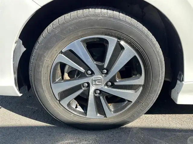 ホンダ フリード ハイブリット EX 奈良県 2017(平29)年 6.8万km ホワイトオーキッドパール 純正ナビ（VXM-174VFXi）/（フルセグ/BT/CD/DVD)/レーダークルーズコントロール/バックカメラ/衝突軽減システム/レーンキープアシスト/両側パワースライドドア/ハーフレザーシート/前席シートヒーター/後席サンシェード/オートライト/前後ドライブレコーダー/ETC/純正15インチＡＷ/取り扱い説明書/スペアキーＸ１