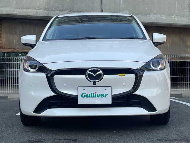 マツダ マツダ２ 15BD 愛知県 2023(令5)年 1.7万km スノーフレイクホワイトパールマイカ ワンオーナー/禁煙車/OP 純正リアルーフスポイラー/純正SDナビ/Bluetooth・USB・Apple CarPlay・AndroidAuto・AM・FM/３６０°セーフティーパッケージ/・３６０°ビューモニター/・フロントパーキングセンサー/・自動防眩ルームミラー/スマートシティーブレーキサポート/クリアランスソナー/ブラインドストップモニター（BSM）/車線逸脱防止システム/横滑り防止システム/スマートキー/プッシュスタート/LEDヘッドライト/オートライト/純正フロアマット/純正ドアバイザー/スペアスマートキー１本/取扱説明書/保証書