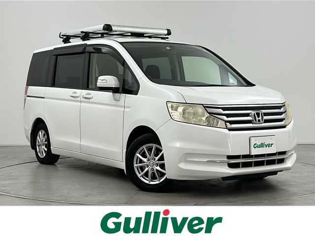 ホンダ ステップワゴン G インターナビEセレクション 群馬県 2012(平24)年 11.4万km ホワイトオーキッドパール 純正ナビ　純正９型後席モニター　バックカメラ　フルセグＴＶ　両側電動スライドドア　ＥＴＣ　ドライブレコーダー　キセノンヘッドライト　オートライト　スマートキー　横滑り防止装置　ルーフキャリア　禁煙