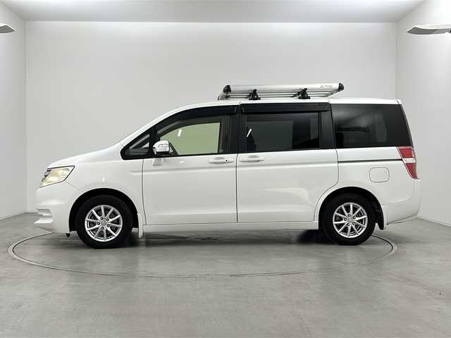 ホンダ ステップワゴン G インターナビEセレクション 群馬県 2012(平24)年 11.4万km ホワイトオーキッドパール 純正ナビ　純正９型後席モニター　バックカメラ　フルセグＴＶ　両側電動スライドドア　ＥＴＣ　ドライブレコーダー　キセノンヘッドライト　オートライト　スマートキー　横滑り防止装置　ルーフキャリア　禁煙