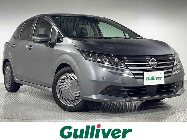 日産 ノート X 神奈川県 2024(令6)年 0.5万km ダークメタルグレー 純正9型ディスプレイオーディオ/AM FM AndroidAuto AppleCarPlay Bluetooth/アラウンドビューモニター/ブラインドスポットモニター/車線逸脱警報/後側方車両検知警報/エマージェンシーブレーキ/速度標識表示/標識検知支援/駐車支援/後退時車両検知警報/ふらつき警報/前席シートヒーター/ステアリングヒーター/ステアリングリモコン/純正ドライブレコーダー/ビルトインETC/フロアマット/LEDヘッドライト/オートライト/オートマチックハイビーム/インテリジェントキー/スペアキー