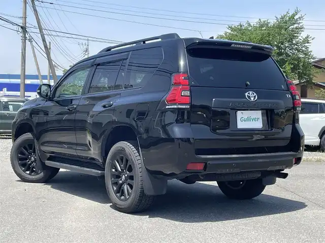 トヨタ ランドクルーザー プラド TX Lパッケージ マットブラED 群馬県 2022(令4)年 2.5万km ブラック サンルーフ/純正メモリナビ（Tコネクティッドナビ）、/　Bluetoothオーディオ、ミラーキャスト/ベージュレザーシート/前席シートヒーター、エアシート、パワーシート/アラウンドビューモニター/ルーフレール/３列目電動格納シート/ウインカーミラー/ビルトインETC2.0/LEDヘッドライト/オートマチックハイビーム/革巻きステア/クリアランスソナー（前後）/社外ドライブレコーダー（前後録画）/プリクラッシュセーフティ/レーンキープアシスト/レーダークルーズコントロール/スマートキー×２/保証書、取説