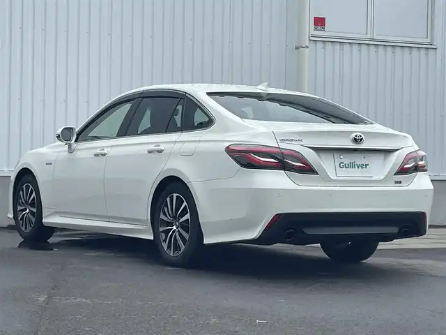 トヨタ クラウン ハイブリッド S Cパッケージ 愛媛県 2019(平31)年 9.5万km ホワイトパールクリスタルシャイン 純正ナビ（Bluetooth/フルセグTV/メモリナビ）/USB/ETC/バックカメラ/AUX接続可能/純正フロアマット/パワーシート/シートヒーター/ステアリングヒーター/バドルシフト/純正アルミホイール/前後コーナーセンサー/クルーズコントロール/LEDヘッドライト/ABS/横滑り防止装置/レーンキープアシスト/盗難防止装置/オートマチックハイビーム/衝突被害軽減システム