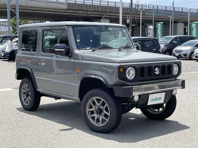 スズキ ジムニー XC 石川県 2022(令4)年 4.2万km ミディアムグレー 4WD/社外メモリーナビ/社外CD/DVD/フルセグTV/LEDヘッドライト/リフトアップ/スマートキー/プッシュスタート/電動ミラー/クルーズコントロール/社外バンパー/シートヒーター