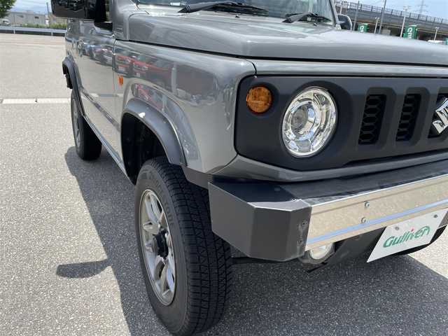 スズキ ジムニー XC 石川県 2022(令4)年 4.2万km ミディアムグレー 4WD/社外メモリーナビ/社外CD/DVD/フルセグTV/LEDヘッドライト/リフトアップ/スマートキー/プッシュスタート/電動ミラー/クルーズコントロール/社外バンパー/シートヒーター