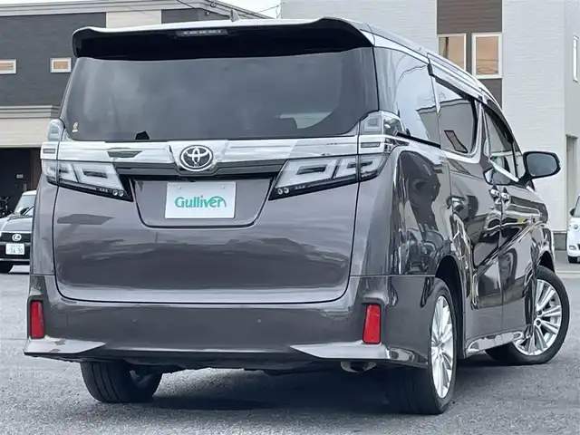 トヨタ ヴェルファイア Z 道央・札幌 2020(令2)年 6.6万km グラファイトM ４WD/寒冷地仕様/純正ディスプレイオーディオ/AM/FM/BT/フルセグ/トヨタセーフティセンス/プリクラッシュセーフティ/横滑り防止装置/レーダークルーズコントロール/レーンキープアシスト/クリアランスソナー/パーキングサポートブレーキ/ロードサインアシスト/バックカメラ/ビルトインETC/ドライブレコーダー/アイドリングストップ/ECOMODE/ワイパーデアイサー/ワイパーデアイサー/両側パワースライドドア/２列目オットマン/レザー調シートカバー/革巻きステアリング/ステアリングリモコン/電動パーキング/ブレーキホールド/MTモード付AT/プッシュスタート/スマートキー/LEDヘッドライト/オートライト/オートハイビーム/フォグランプ/電動格納ミラー/ウィンカーミラー/純正フロアマット/ドアバイザー