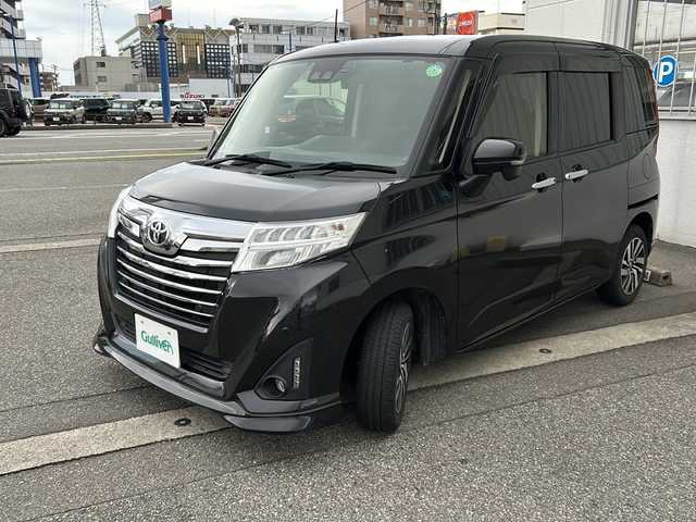 トヨタ ルーミー カスタムG 富山県 2019(平31)年 9.9万km ブラックマイカメタリック スマートキー×２/両側パワースライドドア/リモコンエンジンスターター/純正メモリーナビ(NSZT-W68T)/DVD/MSV/BT/フルセグTV/バックカメラ/ビルトインETC/前後ドラレコ(ZDR016)/衝突安全ブレーキ/オートハイビーム/LEDヘッドライト/フォグ/プッシュスタート/アイドリングストップ/クリアランスソナー/リアロールシェード/シートバックテーブル(D/N)/皮巻きステアリング/ステアリングスイッチ/純正フロアマット/取説・ナビ取説
