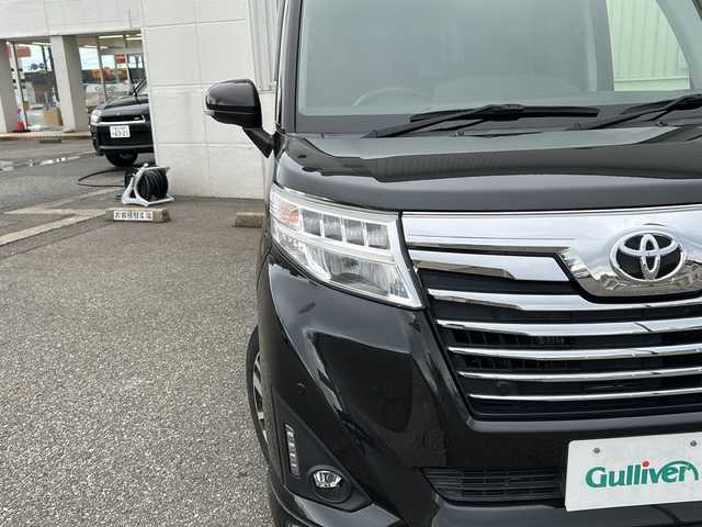 トヨタ ルーミー カスタムG 富山県 2019(平31)年 9.9万km ブラックマイカメタリック スマートキー×２/両側パワースライドドア/リモコンエンジンスターター/純正メモリーナビ(NSZT-W68T)/DVD/MSV/BT/フルセグTV/バックカメラ/ビルトインETC/前後ドラレコ(ZDR016)/衝突安全ブレーキ/オートハイビーム/LEDヘッドライト/フォグ/プッシュスタート/アイドリングストップ/クリアランスソナー/リアロールシェード/シートバックテーブル(D/N)/皮巻きステアリング/ステアリングスイッチ/純正フロアマット/取説・ナビ取説