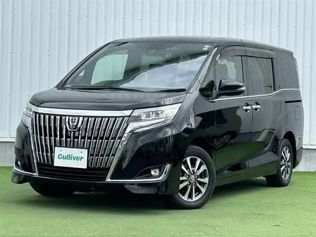 トヨタ エスクァイア Gi 香川県 2019(令1)年 3.9万km ブラック 純正10インチメモリーナビ（NSZN-Z68T）/→AM/FM/CD/DVD/Bluetooth/フルセグTV/フリップダウンモニター/バックカメラ/両側パワースライドドア/黒革シート/シートヒーター/ビルトイン2.0ETC/ウッドコンビステアリング/クルーズコントロール/衝突軽減ブレーキ/レーンキープアシスト/アイドリングストップ/LEDヘッドライト/オートハイビーム/前方ドライブレコーダー/コーナーセンサー/純正15インチアルミホイール/純正フロアマット/サンシェード/プッシュスタート/スマートキー