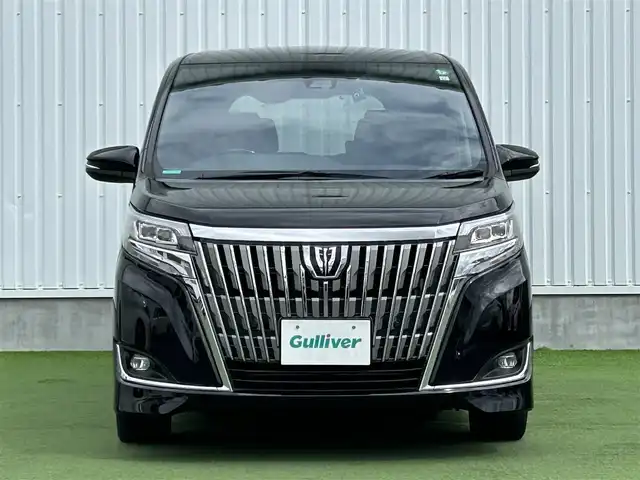 トヨタ エスクァイア Gi 香川県 2019(令1)年 3.9万km ブラック 純正10インチメモリーナビ（NSZN-Z68T）/→AM/FM/CD/DVD/Bluetooth/フルセグTV/フリップダウンモニター/バックカメラ/両側パワースライドドア/黒革シート/シートヒーター/ビルトイン2.0ETC/ウッドコンビステアリング/クルーズコントロール/衝突軽減ブレーキ/レーンキープアシスト/アイドリングストップ/LEDヘッドライト/オートハイビーム/前方ドライブレコーダー/コーナーセンサー/純正15インチアルミホイール/純正フロアマット/サンシェード/プッシュスタート/スマートキー