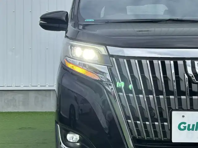 トヨタ エスクァイア Gi 香川県 2019(令1)年 3.9万km ブラック 純正10インチメモリーナビ（NSZN-Z68T）/→AM/FM/CD/DVD/Bluetooth/フルセグTV/フリップダウンモニター/バックカメラ/両側パワースライドドア/黒革シート/シートヒーター/ビルトイン2.0ETC/ウッドコンビステアリング/クルーズコントロール/衝突軽減ブレーキ/レーンキープアシスト/アイドリングストップ/LEDヘッドライト/オートハイビーム/前方ドライブレコーダー/コーナーセンサー/純正15インチアルミホイール/純正フロアマット/サンシェード/プッシュスタート/スマートキー
