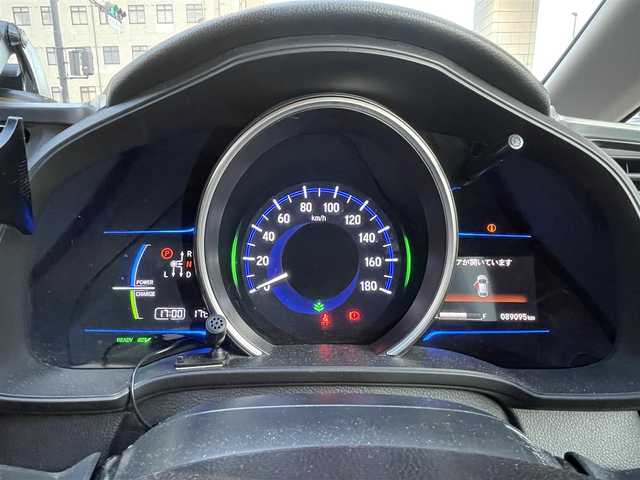 ホンダ フィット ハイブリット Lパッケージ 岡山県 2014(平26)年 9.1万km クリスタルブラックパール 登録時走行距離90957km/純正SDナビ/(AM/FM/DISC/TV/BT)/衝突被害軽減システム/クルーズコントロール/バックカメラ/ETC/ドライブレコーダー/チップアップシート/プッシュスタート/スマートキー/スペアキー/スターターキー/社外15インチアルミホイール/記録簿/保証書/取扱説明書