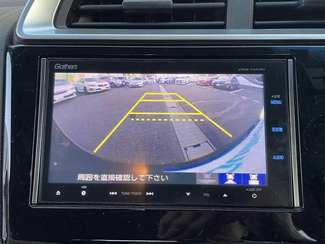 ホンダ フィット ハイブリット Lパッケージ 岡山県 2014(平26)年 9.1万km クリスタルブラックパール 登録時走行距離90957km/純正SDナビ/(AM/FM/DISC/TV/BT)/衝突被害軽減システム/クルーズコントロール/バックカメラ/ETC/ドライブレコーダー/チップアップシート/プッシュスタート/スマートキー/スペアキー/スターターキー/社外15インチアルミホイール/記録簿/保証書/取扱説明書