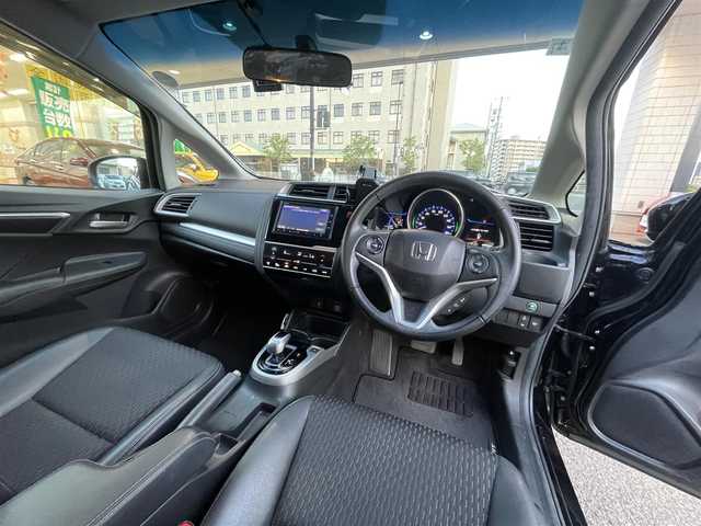 ホンダ フィット ハイブリット Lパッケージ 岡山県 2014(平26)年 9.1万km クリスタルブラックパール 登録時走行距離90957km/純正SDナビ/(AM/FM/DISC/TV/BT)/衝突被害軽減システム/クルーズコントロール/バックカメラ/ETC/ドライブレコーダー/チップアップシート/プッシュスタート/スマートキー/スペアキー/スターターキー/社外15インチアルミホイール/記録簿/保証書/取扱説明書