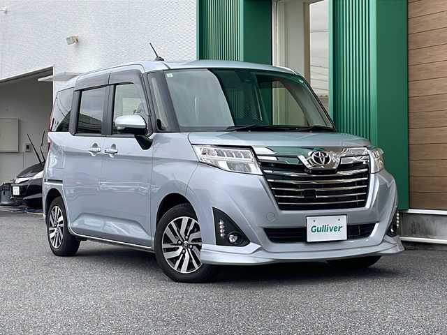 トヨタ ルーミー カスタムG S 岐阜県 2017(平29)年 0.7万km ブライトシルバーM 禁煙車/AM/FM/CD/SD/BT/純正ナビ/ワンセグTV/クルーズコントロール/衝突軽減ブレーキ/両側パワースライドドア/アイドリングストップ/純正アルミホイール/純正フロアマット/ドアバイザー/プッシュスタート/オートライト/オートハイビーム/電動格納ミラー/スマートキー/スペアキー
