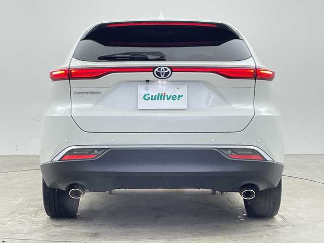 トヨタ ハリアー Z 兵庫県 2021(令3)年 3.8万km ホワイトパールクリスタルシャイン ・純正12インチT-Connect SDナビゲーションシステム/・全周囲カメラ/・ヘッドアップディスプレイ/・JBLプレミアムサウンド/・ブラインドスポットモニター/・フルセグTV/・BT・AM・FM・MiraCast/・Apple Car Play・AndroidAuto/・デジタルインナーミラー/・パワーバックドア/・MTモード付AT/・レーダークルーズコントロール/・レーントレーシングアシスト/・インテリジェントクリアランスソナー/・リアクロストラフィックアラート/・先行者発進告知/・後退速度抑制/・オートホールド/・電子パーキングブレーキ/・置くだけ充電/・パワーシート/・前後ドライブレコーダー/・ビルトインETC/・ステアリングスイッチ/・ハーフレザーシート/・純正フロアマット/・LEDヘッドライト/・オートライト/・アダプティブハイビーム/・フォグランプ/・スマートキー/・純正19インチアルミホイール