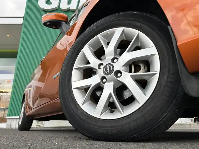 日産 ノート e－パワー X Vセレクション 宮城県 2020(令2)年 6万km プレミアムコロナオレンジ インテリジェントクルーズコントロールセット/・インテリジェントクルーズコントロール/・車線逸脱防止支援システム/＝＝＝/インテリジェントエマージェンシーブレーキ/車線逸脱警報/踏み間違い衝突防止アシスト/フロント＆バックソナー/純正ナビ（MM319D-W）/・CD/DVD/・Bluetooth/・フルセグTV/ドライブレコーダー/ETC/LEDヘッドランプ/ハイビームアシスト/オートライト/スマートキー＆プッシュスタート/助手席回転シート/電動格納ミラー/純正15インチAW/純正フロアマット/Wエアバッグ