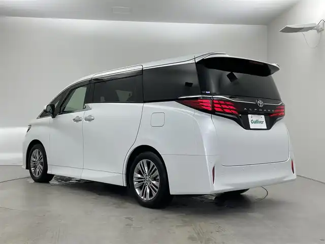トヨタ アルファード Z 埼玉県 2023(令5)年 1.1万km プラチナホワイトパールマイカ ガラスルーフ　ユニバーサルステップ　純正１４インチディスプレイオーディオ　フリップダウンモニター　パノラミックビューモニター　セーフティセンス　ミラー型前後ドラレコ　ワイヤレス充電　メモリシート　シートヒーター　ベンチレーション　両側パワースライドドア  スマートキー　オートライト　純正アルミホイール　LEDヘッドライト 地デジフルセグＴＶ