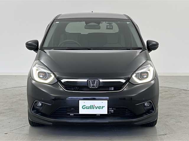 ホンダ フィット e:HEVネス 宮城県 2020(令2)年 6.4万km クリスタルブラックパール 1オーナー/Honda SENSING	/・衝突軽減ブレーキ	/・路外逸脱抑制機能	/・アダプティブクルーズコントロール/・車線維持支援システム/・オートハイビーム	/バックカメラ/純正9型DAナビ　地図SD無/・BT.CD.DVD.USB/フルセグTV/ドライブレコーダー（FR）/ビルトインETC/LEDヘッドライト/LEDフォグランプ/電動パーキングブレーキ/横滑り防止装置/アイドリングストップ/純正16inAW/純正フロアマット/プッシュスタート/スマートキー×2