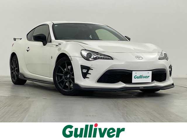 トヨタ ８６ GT リミテッド ブラックPKG 群馬県 2018(平30)年 9.2万km クリスタルホワイトパール 〈GT”Limited・Black Package”〉/・brembo専用17インチアルミホイール(ブラック塗装、センターオーナメント)/・brembo製ベンチレーテッドディスクブレーキ(フロント/リヤ)/・リヤスポイラー/・リヤフォグランプ/・LEDフォグランプ/・革巻きシフトレバーノブ＆パーキングブレーキレバー/―――――――――/トヨタ純正ナビ(型式：NSZT-W66T)/・フルセグTV/BT/CD/DVD/AM/FM/バックカメラ/TOM’Sエアロ(フロント/サイド)/TRDマフラー/ETC/ドライブレコーダー/シートヒーター/クルーズコントロール/社外コーナーセンサー/LEDヘッドライト/プッシュスタート/スマートキー/ヒルスタートアシストコントロール/走行制御モードスイッチ/左右独立温度コントロールフルオートエアコン