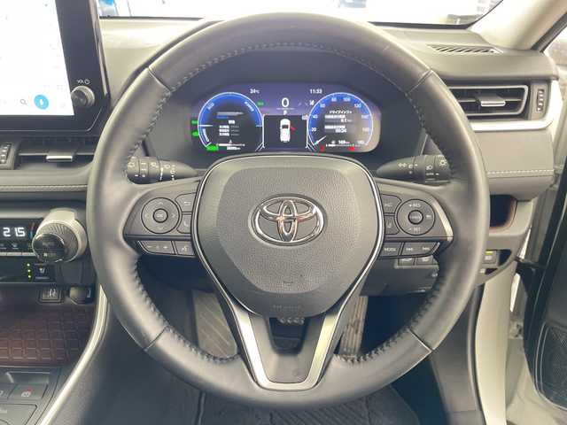 トヨタ ＲＡＶ４ ハイブリッドG 道央・札幌 2023(令5)年 2.9万km プラチナホワイトパールマイカ ・４WD /ハイブリッド/・モデリスタエアロF.S.R/・トヨタセーフティーセンス/・プリクラッシュセーフティー/・レーダークルーズコントロール/・ブラインドスポットモニター/・純正10インチディスプレイ/・ナビ.Bluetooth.フルセグ.miracast/・パノラミックビューモニター/・パワーバックドア /・レザーシート/パワーシート/・ベンチレーション/・ステアリングヒーター/・LEDライト/オートハイビーム/・ビルトインETC/・スマートキーx２