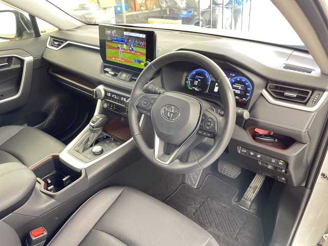 トヨタ ＲＡＶ４ ハイブリッドG 道央・札幌 2023(令5)年 2.9万km プラチナホワイトパールマイカ ・４WD /ハイブリッド/・モデリスタエアロF.S.R/・トヨタセーフティーセンス/・プリクラッシュセーフティー/・レーダークルーズコントロール/・ブラインドスポットモニター/・純正10インチディスプレイ/・ナビ.Bluetooth.フルセグ.miracast/・パノラミックビューモニター/・パワーバックドア /・レザーシート/パワーシート/・ベンチレーション/・ステアリングヒーター/・LEDライト/オートハイビーム/・ビルトインETC/・スマートキーx２