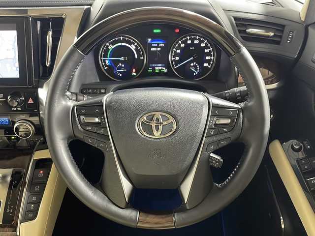 トヨタ アルファードハイブリット G 広島県 2019(令1)年 3.5万km ラグジュアリーホワイトパールクリスタルシャインガラスフレーク 白革シート/JBLプレミアムサウンド/パノラミックビューモニター/ALPINE12.8型フリップダウンモニター/純正9型ナビ（フルセグTV/Bluetooth）/3眼LEDヘッドランプ/デジタルインナーミラー/パワーバックドア/パワーシート/ポジションメモリー/シートヒーター/ベンチレーション/セーフティセンス/・プリクラッシュセーフティ/・レーントレーシングアシスト/・アダプティブハイビーム/・レーダークルーズコントロール/クリアランスソナー/ブラインドスポットモニター/ETC2.0/ドライブレコーダー/USB入力端子