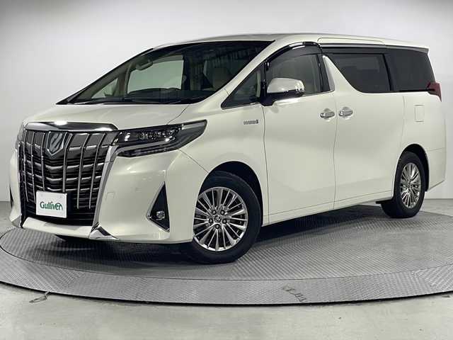 トヨタ アルファードハイブリット G 広島県 2019(令1)年 3.5万km ラグジュアリーホワイトパールクリスタルシャインガラスフレーク 白革シート/JBLプレミアムサウンド/パノラミックビューモニター/ALPINE12.8型フリップダウンモニター/純正9型ナビ（フルセグTV/Bluetooth）/3眼LEDヘッドランプ/デジタルインナーミラー/パワーバックドア/パワーシート/ポジションメモリー/シートヒーター/ベンチレーション/セーフティセンス/・プリクラッシュセーフティ/・レーントレーシングアシスト/・アダプティブハイビーム/・レーダークルーズコントロール/クリアランスソナー/ブラインドスポットモニター/ETC2.0/ドライブレコーダー/USB入力端子