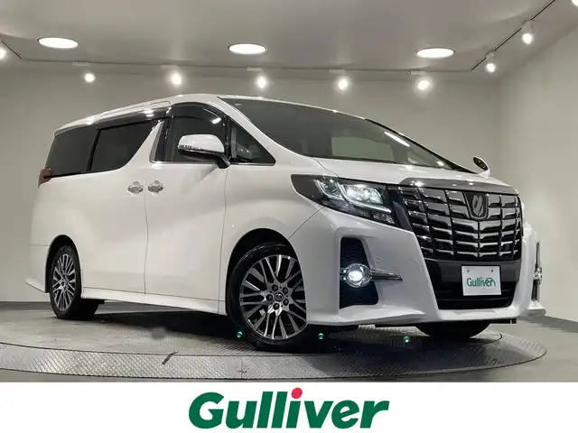 トヨタ アルファード S Cパッケージ 愛知県 2016(平28)年 8.7万km ホワイトパールクリスタルシャイン 純正10インチナビ/（Bluetooth/AM/FM/フルセグTV/CD）/サンルーフ/フリップダウンモニター/衝突軽減ブレーキ/両側電動スライドドア/レーダークルーズコントロール/三眼LEDヘッドライト/ETC/バックカメラ/ステアリングヒーター/パワーシート/電動リアゲート/コーナーセンサー/プッシュスタートボタン/スマートキー/純正18インチAW