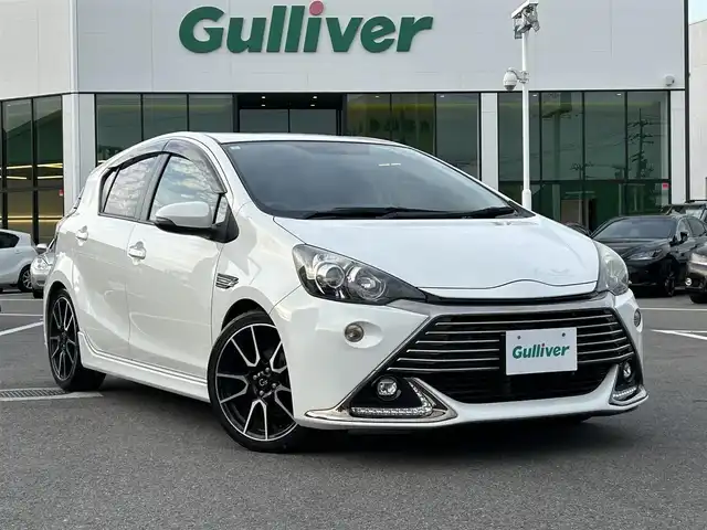 トヨタ アクア G G’s 愛媛県 2015(平27)年 8.1万km ライムホワイトパールクリスタルシャイン 純正ナビ/フルセグTV/バックカメラ/クルーズコントロール/ETC/スマートキー/スペアキー/プッシュスタート/純正AW/純正フロアマット/ハーフレザーシート/シートヒーター/ステアリングスイッチ/電格ミラー