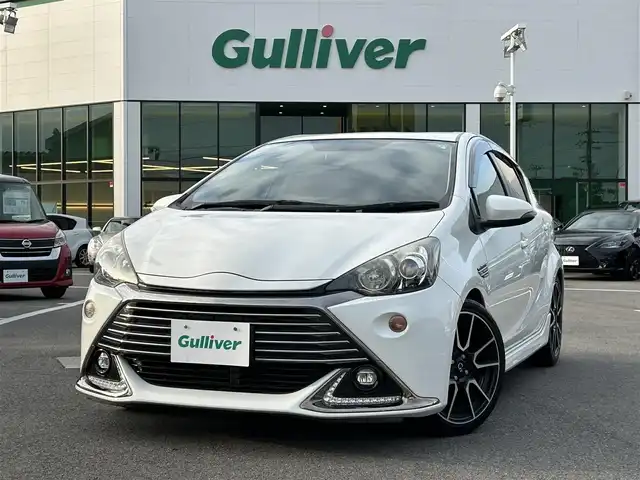 トヨタ アクア G G’s 愛媛県 2015(平27)年 8.1万km ライムホワイトパールクリスタルシャイン 純正ナビ/フルセグTV/バックカメラ/クルーズコントロール/ETC/スマートキー/スペアキー/プッシュスタート/純正AW/純正フロアマット/ハーフレザーシート/シートヒーター/ステアリングスイッチ/電格ミラー