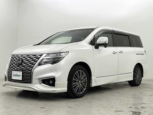 日産 エルグランド 250ハイウェイスターS 宮城県 2021(令3)年 5.4万km ピュアホワイトパール 禁煙車/インテリジェントクルーズコントロール/エマージェンシーブレーキ/車線逸脱警報/車線逸脱防止支援システム/後側方車両検知警報/後側方衝突防止支援システム/ソナー/速度標識表示/道路標識表示/社外10.1インチナビ/（BT.CD.AM.FM.SD.AUX.Applecarplay）/フルセグテレビ/バックカメラ/ビルトインETC/前後ドライブレコーダー/両側パワースライドドア/革巻きステアリング/ステアリングスイッチ/プッシュスタート/スマートキー/ハーフレザーシート/3列シート/オットマン/ロールサンシェード/純正フロアマット/LEDヘッドライト/フォグランプ/純正18インチアルミホイール/ドアバイザー/横滑り防止機能