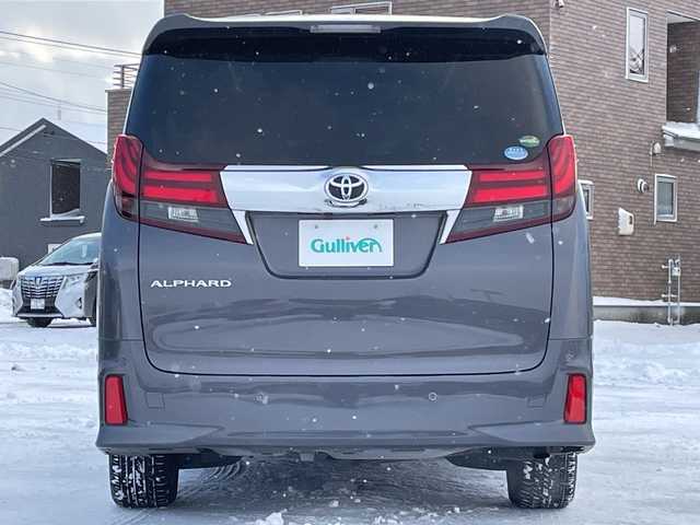 トヨタ アルファード S Cパッケージ 道央・札幌 2015(平27)年 6.9万km グレーメタリック ４WD/JBLプレミアムサウンド/純正メモリーナビ/AM/FM/BT/SD/CD/フルセグ/純正フリップダウンモニター/トヨタセーフティセンス/衝突被害軽減ブレーキ/横滑り防止装置/レーダークルーズコントロール/レーンキープアシスト/パーキングアシスト/クリアランスソナー/バックカメラ/ビルトインETC/ドライブレコーダー/アイドリングストップ/ECOMODE/両側パワースライドドア/パワーバックドア/前席/2列目パワーシート/D席メモリーシート/N席/2列目オットマン/ハーフレザーシート/革巻きウッドコンビステアリング/ステアリングリモコン/ハンドルヒーター/AC100V/電動パーキング/ブレーキホールド/自動防眩ミラー/MTモード付AT/プッシュスタート/スマートキー/LEDヘッドライト/オートライト/フォグランプ/電動格納ミラー/ウィンカーミラー/純正フロアマット/ドアバイザー/スペアキー