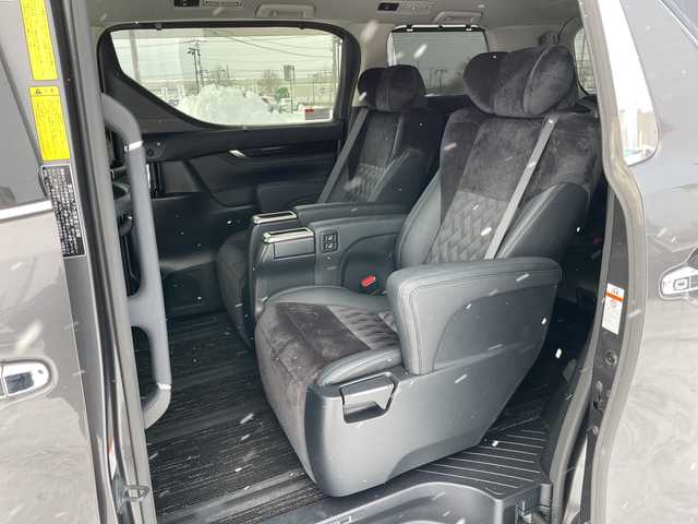 トヨタ アルファード S Cパッケージ 道央・札幌 2015(平27)年 6.9万km グレーメタリック ４WD/JBLプレミアムサウンド/純正メモリーナビ/AM/FM/BT/SD/CD/フルセグ/純正フリップダウンモニター/トヨタセーフティセンス/衝突被害軽減ブレーキ/横滑り防止装置/レーダークルーズコントロール/レーンキープアシスト/パーキングアシスト/クリアランスソナー/バックカメラ/ビルトインETC/ドライブレコーダー/アイドリングストップ/ECOMODE/両側パワースライドドア/パワーバックドア/前席/2列目パワーシート/D席メモリーシート/N席/2列目オットマン/ハーフレザーシート/革巻きウッドコンビステアリング/ステアリングリモコン/ハンドルヒーター/AC100V/電動パーキング/ブレーキホールド/自動防眩ミラー/MTモード付AT/プッシュスタート/スマートキー/LEDヘッドライト/オートライト/フォグランプ/電動格納ミラー/ウィンカーミラー/純正フロアマット/ドアバイザー/スペアキー