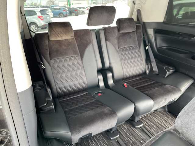 トヨタ アルファード S Cパッケージ 道央・札幌 2015(平27)年 6.9万km グレーメタリック ４WD/JBLプレミアムサウンド/純正メモリーナビ/AM/FM/BT/SD/CD/フルセグ/純正フリップダウンモニター/トヨタセーフティセンス/衝突被害軽減ブレーキ/横滑り防止装置/レーダークルーズコントロール/レーンキープアシスト/パーキングアシスト/クリアランスソナー/バックカメラ/ビルトインETC/ドライブレコーダー/アイドリングストップ/ECOMODE/両側パワースライドドア/パワーバックドア/前席/2列目パワーシート/D席メモリーシート/N席/2列目オットマン/ハーフレザーシート/革巻きウッドコンビステアリング/ステアリングリモコン/ハンドルヒーター/AC100V/電動パーキング/ブレーキホールド/自動防眩ミラー/MTモード付AT/プッシュスタート/スマートキー/LEDヘッドライト/オートライト/フォグランプ/電動格納ミラー/ウィンカーミラー/純正フロアマット/ドアバイザー/スペアキー