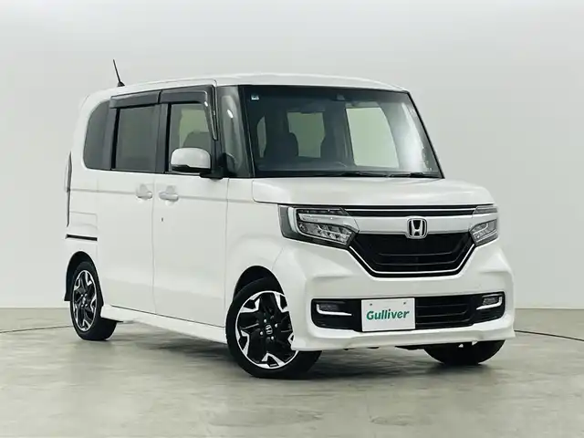 ホンダ Ｎ ＢＯＸ カスタム G L ターボ ホンダセンシング 福島県 2020(令2)年 3.7万km プラチナホワイトパール ホンダセンシング/・衝突軽減ブレーキ/・路外逸脱抑制装置/・レーダークルーズコントロール/・先行車発進お知らせ機能/・標識認識機能/純正8インチ大画面ナビ/・型番：VXU-207NBi/・フルセグTV/Bluetooth/CD/DVD/・バックカメラ/・ETC/・前後ドライブレコーダー/両側パワースライドドア/革巻きステアリング/・パドルシフト/・ステアリングリモコン/ハーフレザーシート/・シートヒーター(運転席/助手席)/プッシュスタート/・スマートキー/・スペアキー/LEDヘッドライト/・オートライト/純正フロアマット/ドアバイザー/取扱説明書/保証書