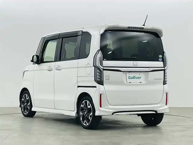 ホンダ Ｎ ＢＯＸ カスタム G L ターボ ホンダセンシング 福島県 2020(令2)年 3.7万km プラチナホワイトパール ホンダセンシング/・衝突軽減ブレーキ/・路外逸脱抑制装置/・レーダークルーズコントロール/・先行車発進お知らせ機能/・標識認識機能/純正8インチ大画面ナビ/・型番：VXU-207NBi/・フルセグTV/Bluetooth/CD/DVD/・バックカメラ/・ETC/・前後ドライブレコーダー/両側パワースライドドア/革巻きステアリング/・パドルシフト/・ステアリングリモコン/ハーフレザーシート/・シートヒーター(運転席/助手席)/プッシュスタート/・スマートキー/・スペアキー/LEDヘッドライト/・オートライト/純正フロアマット/ドアバイザー/取扱説明書/保証書