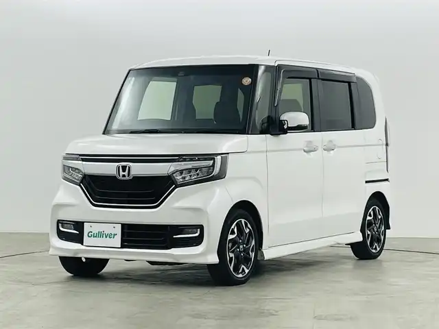 ホンダ Ｎ ＢＯＸ カスタム G L ターボ ホンダセンシング 福島県 2020(令2)年 3.7万km プラチナホワイトパール ホンダセンシング/・衝突軽減ブレーキ/・路外逸脱抑制装置/・レーダークルーズコントロール/・先行車発進お知らせ機能/・標識認識機能/純正8インチ大画面ナビ/・型番：VXU-207NBi/・フルセグTV/Bluetooth/CD/DVD/・バックカメラ/・ETC/・前後ドライブレコーダー/両側パワースライドドア/革巻きステアリング/・パドルシフト/・ステアリングリモコン/ハーフレザーシート/・シートヒーター(運転席/助手席)/プッシュスタート/・スマートキー/・スペアキー/LEDヘッドライト/・オートライト/純正フロアマット/ドアバイザー/取扱説明書/保証書