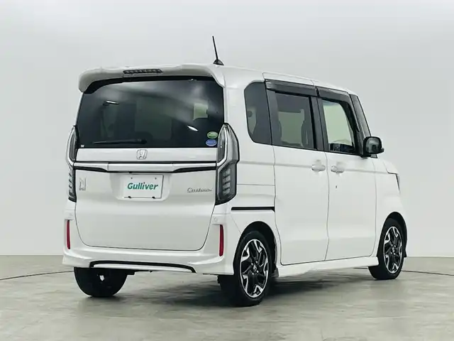 ホンダ Ｎ ＢＯＸ カスタム G L ターボ ホンダセンシング 福島県 2020(令2)年 3.7万km プラチナホワイトパール ホンダセンシング/・衝突軽減ブレーキ/・路外逸脱抑制装置/・レーダークルーズコントロール/・先行車発進お知らせ機能/・標識認識機能/純正8インチ大画面ナビ/・型番：VXU-207NBi/・フルセグTV/Bluetooth/CD/DVD/・バックカメラ/・ETC/・前後ドライブレコーダー/両側パワースライドドア/革巻きステアリング/・パドルシフト/・ステアリングリモコン/ハーフレザーシート/・シートヒーター(運転席/助手席)/プッシュスタート/・スマートキー/・スペアキー/LEDヘッドライト/・オートライト/純正フロアマット/ドアバイザー/取扱説明書/保証書