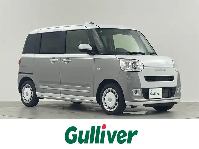 ダイハツ ムーヴ キャンバス ストライプス G 埼玉県 2024(令6)年 0.5万km シャイニングホワイトパール/スムーズグレーマイカメタリック 純正ナビ　Ｂｌｕｅｔｏｏｔｈ　フルセグ　ＤＶＤ／ＣＤ　ＵＳＢ　全方位カメラ　前席シートヒーター　両側パワースライドドア　ベンチシート　フルフラットシート　コーナーセンサー　ＬＥＤヘッドライト