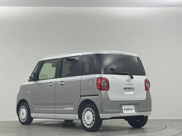 ダイハツ ムーヴ キャンバス ストライプス G 埼玉県 2024(令6)年 0.5万km シャイニングホワイトパール/スムーズグレーマイカメタリック 純正ナビ　Ｂｌｕｅｔｏｏｔｈ　フルセグ　ＤＶＤ／ＣＤ　ＵＳＢ　全方位カメラ　前席シートヒーター　両側パワースライドドア　ベンチシート　フルフラットシート　コーナーセンサー　ＬＥＤヘッドライト
