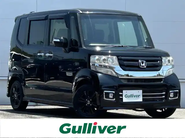 ホンダ Ｎ ＢＯＸ カスタム SSブラックSパッケージ 佐賀県 2016(平28)年 5.6万km 黒 純正８インチナビ/・バックカメラ　/・フルセグTV/BT/CD/DVD　/両側パワースライドドア　/純正オールブラック１４インチAW　/HIDヘッドライト　/オートライト/フォグランプ　/ETC　/前席シートヒーター　/プッシュスタート/ステアリングスイッチ/リアサンシェード/リアバックテーブル/電動格納ミラー　/室内ロッドキャリア